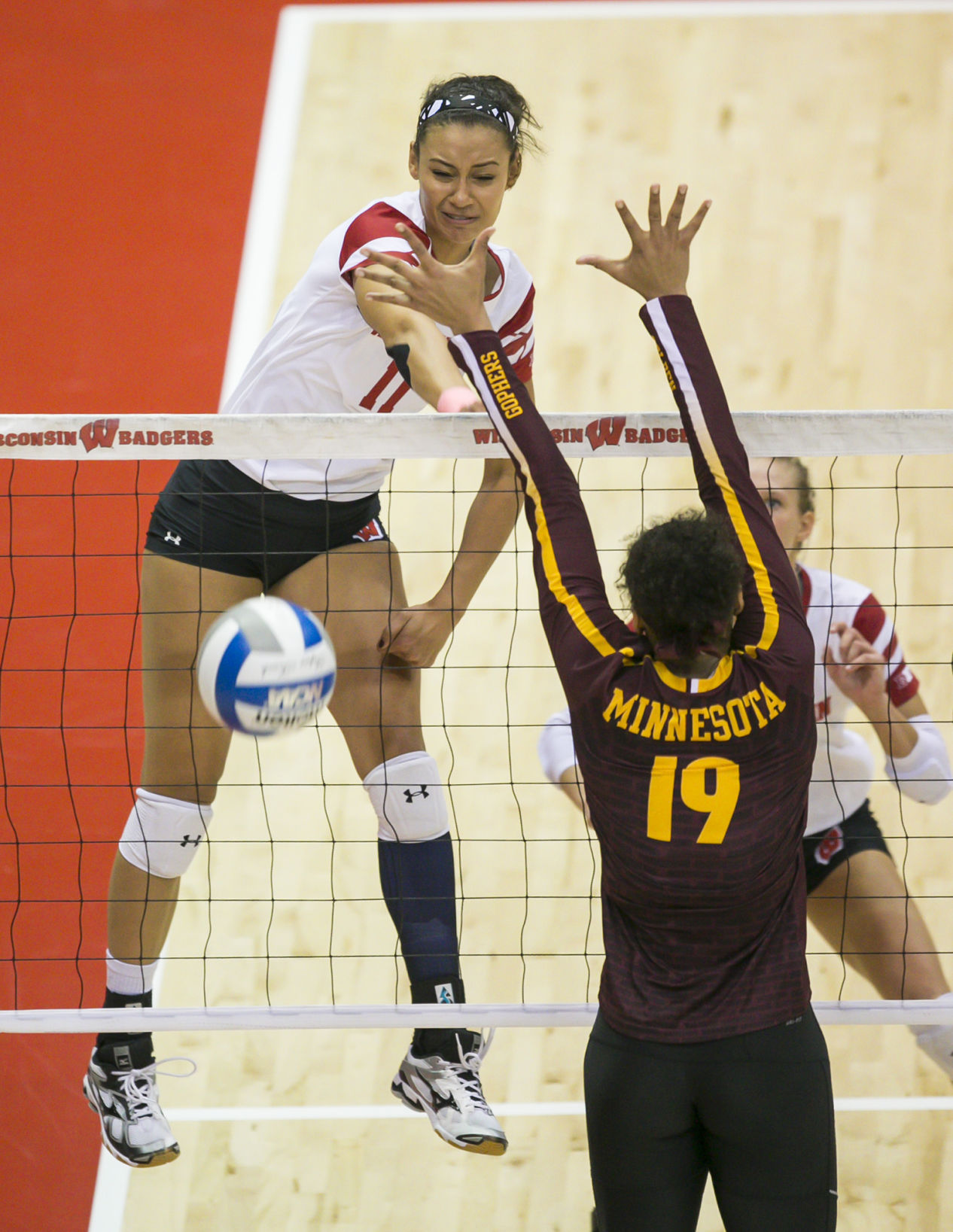 Tionna Williams makes a kill, Badgers volleyball
